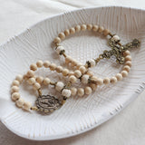 Our Lady of Fatima Cream Wood and Calcutta Stone Rosary