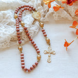 Miraculous Medal Orange Wood and Gold Rosary